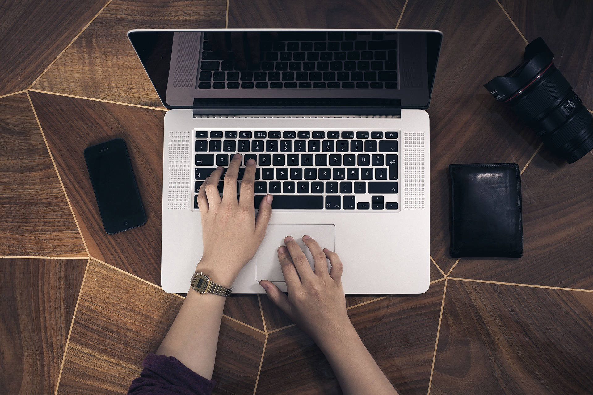 Managed IT Services Tasmania - Typing on Laptop